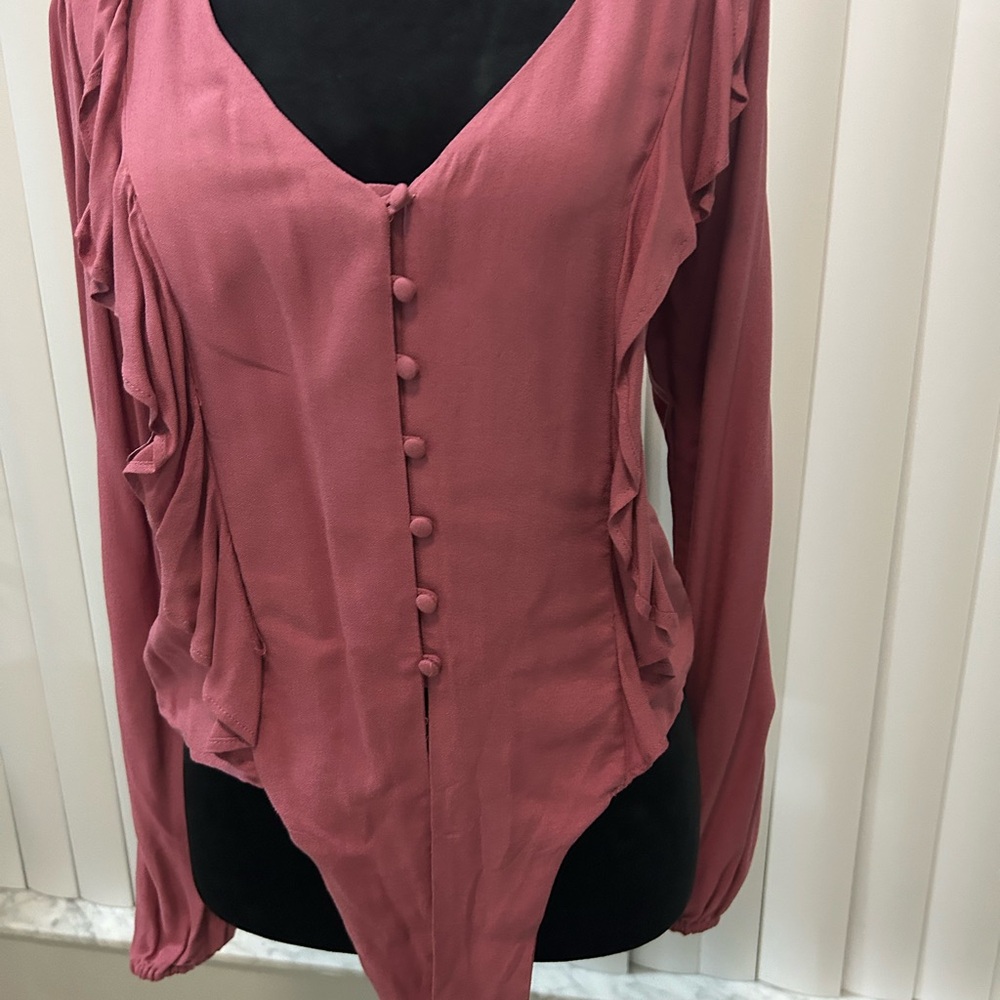 The color on tag listed as Mauve Wood long sleeve with elastic wristband